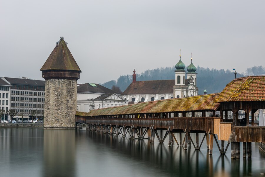 lucerne-jesuit-church-surrounded-by-water-cloudy-sky-lucerne-switzerland_181624-10457.jpg